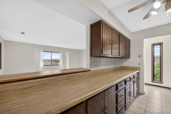 an empty room with wooden floor
