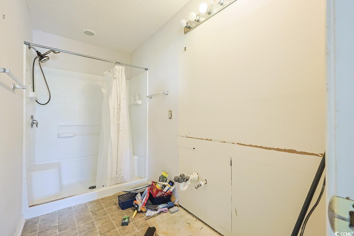 308 Kiskadee Loop, Unit E Conway, SC 29526 - Photo 14 of 28 Full bathroom with a stall shower