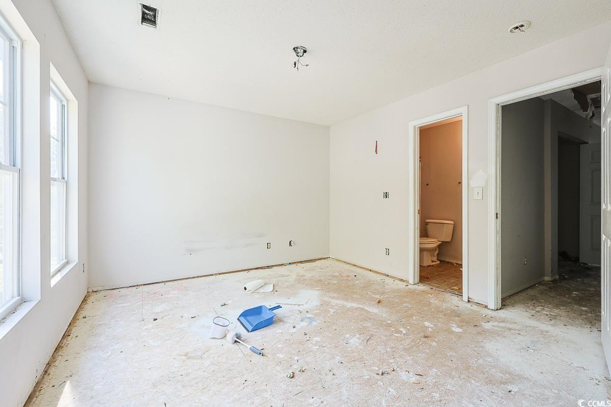 308 Kiskadee Loop, Unit E Conway, SC 29526 - Photo 17 of 28 Unfurnished bedroom with ensuite bath