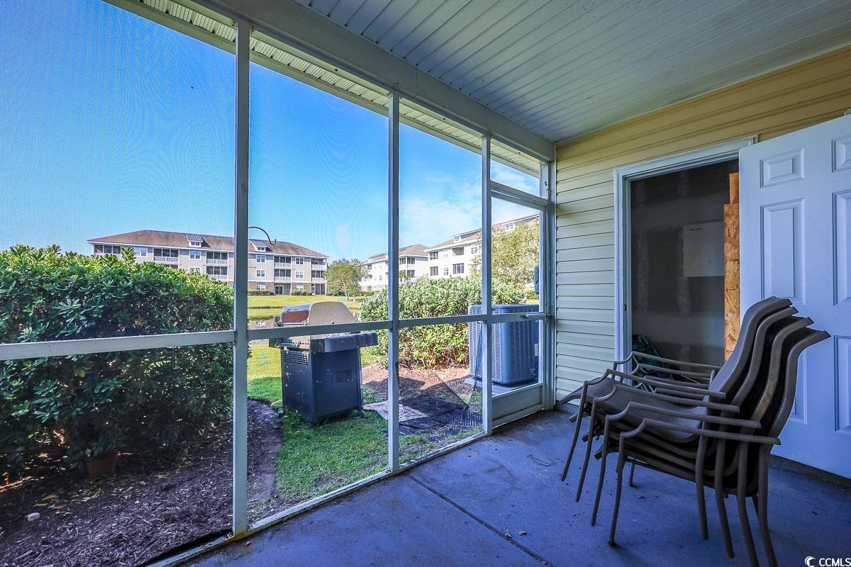 308 Kiskadee Loop, Unit E Conway, SC 29526 - Photo 20 of 28 View of sunroom