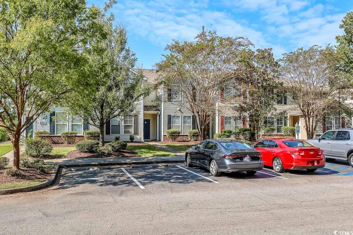 308 Kiskadee Loop, Unit E Conway, SC 29526 - Photo 27 of 28 View of property featuring uncovered parking