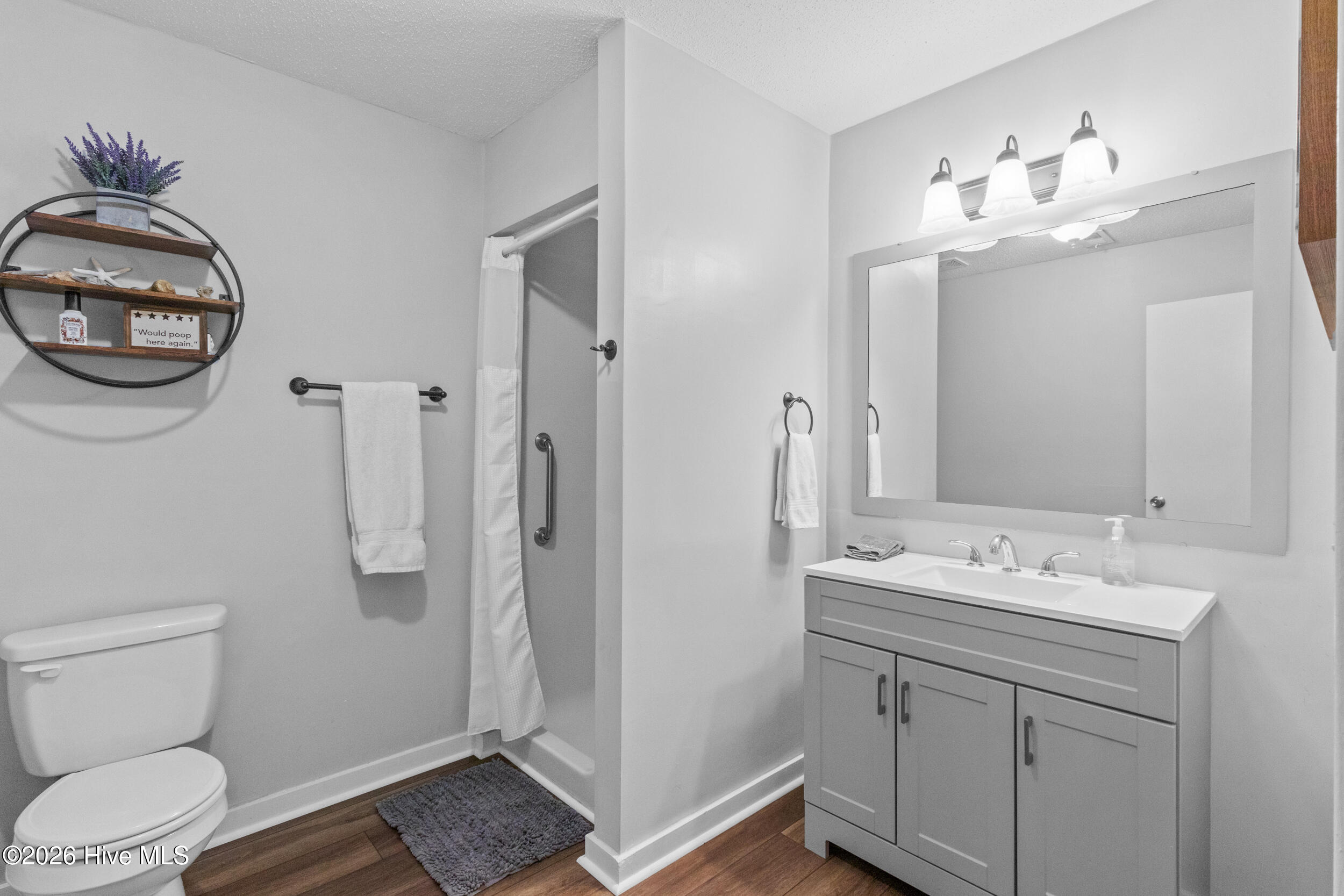 718 Azalea Drive, Unit 458 Hampstead, NC 28443 - Photo 21 of 38 22_bathroom