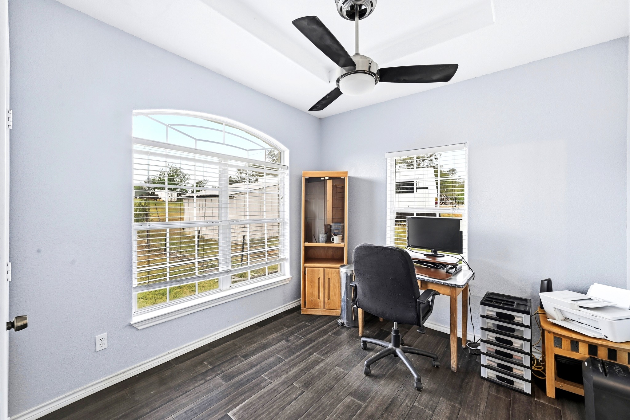 127 KLBJ Road Smithville, TX 78957 - Photo 24 of 39 a view of a workspace with furniture and a window