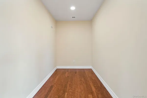 a view of wooden floor in a bathroom