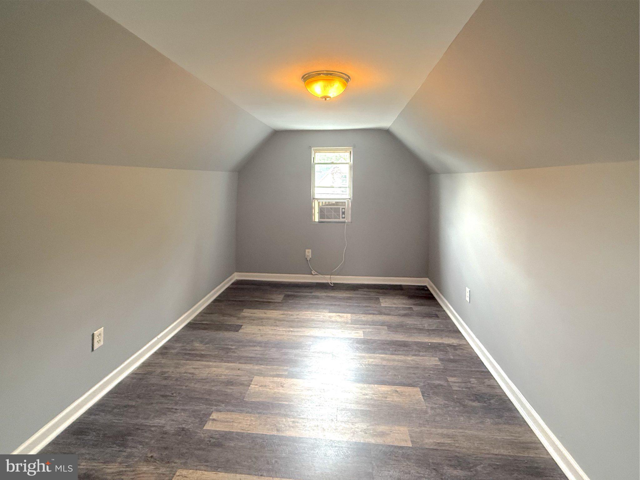 304 Collins Avenue, Unit 2 Baltimore, MD 21229 - Photo 13 of 17 Cozy attic space with natural light.