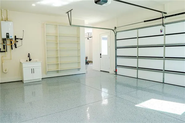 a bathroom with a glass shower door