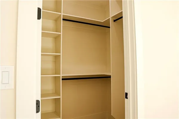 a kitchen with stainless steel appliances a stove and a refrigerator