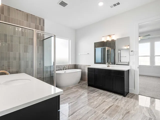 a bathroom with a sink a toilet and a bathtub
