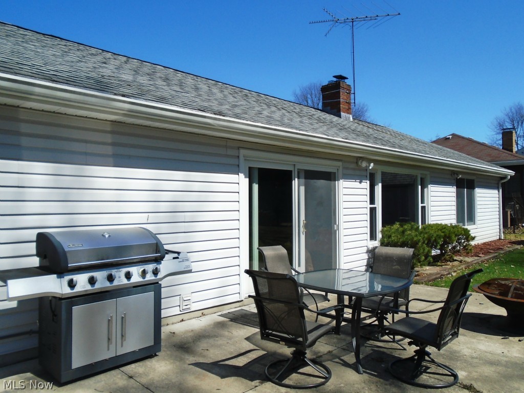 453 Overwood Road Akron, OH 44313 - Photo 24 of 24 The back patio show shows the space of rear of the home! Updated roof!