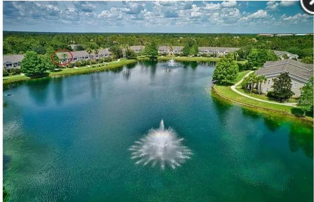 a view of a lake with outdoor space