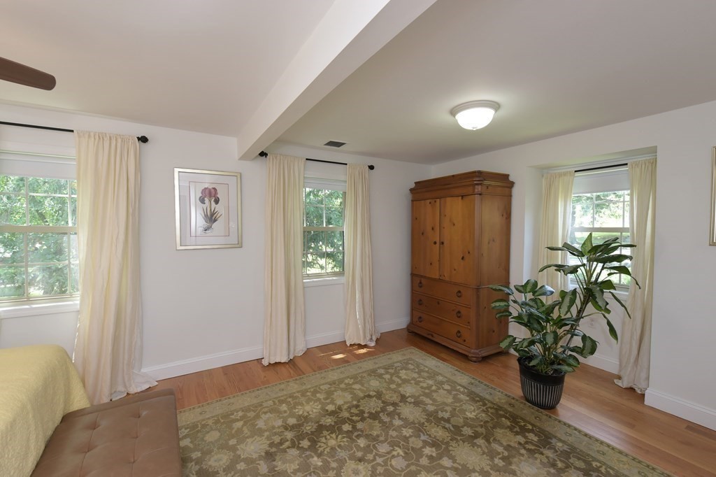 31 Elm Street Upton, MA 01568 - Photo 12 of 33 a living room with furniture and a potted plant