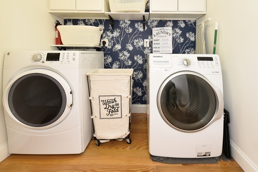 31 Elm Street Upton, MA 01568 - Photo 26 of 33 a utility room with dryer and washer