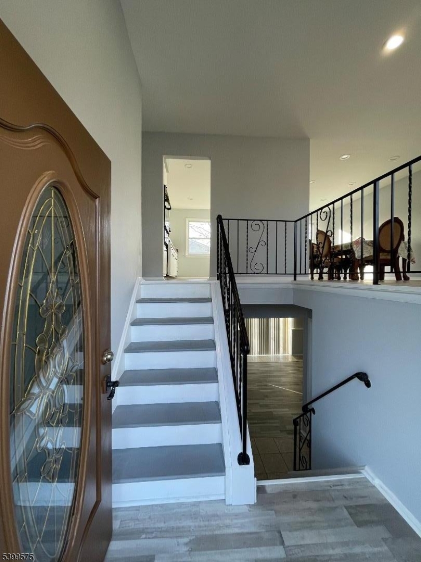 57 Greenbrook Road Middlesex, NJ 08846 - Photo 2 of 14 a view of entryway and hall with wooden floor