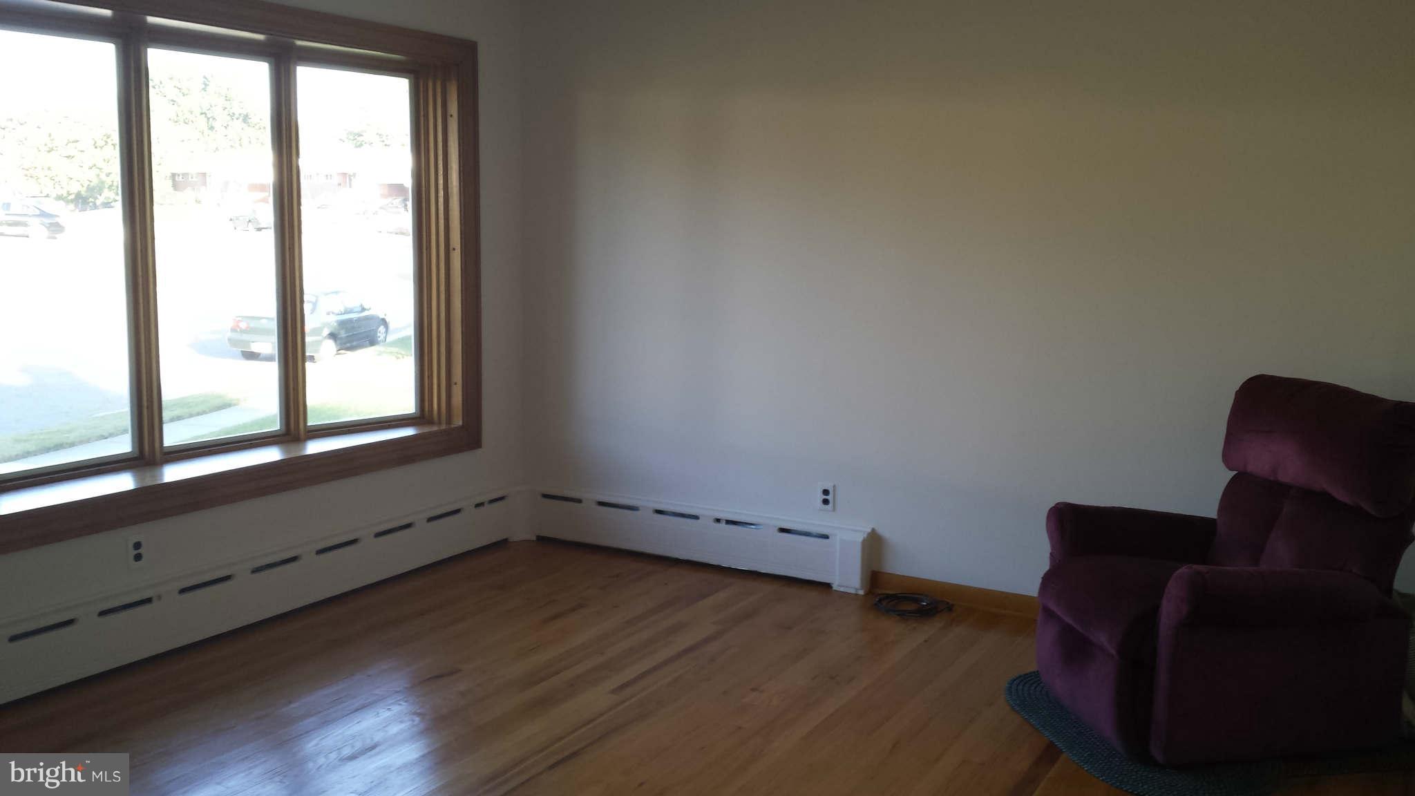 1514 Cavel Road Baltimore, MD 21237 - Photo 2 of 25 Sun-drenched living room