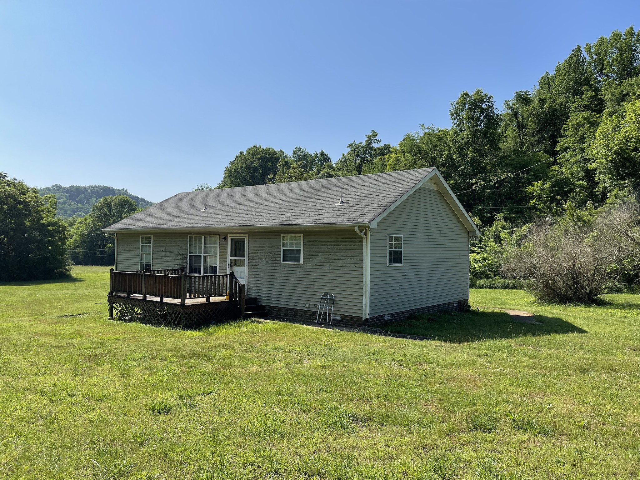 232 Old Walls Road Pulaski, TN 38478 - Photo 3 of 22 a house with trees in the background