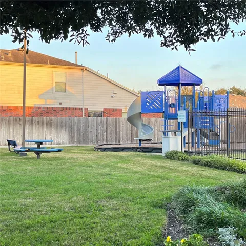 a view of a garden with a slide