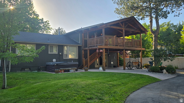 11077 Susan Drive Sandy, UT 84092 - Photo 2 of 20 Rear view of property with a hot tub, a patio area, a wooden deck, and stairs