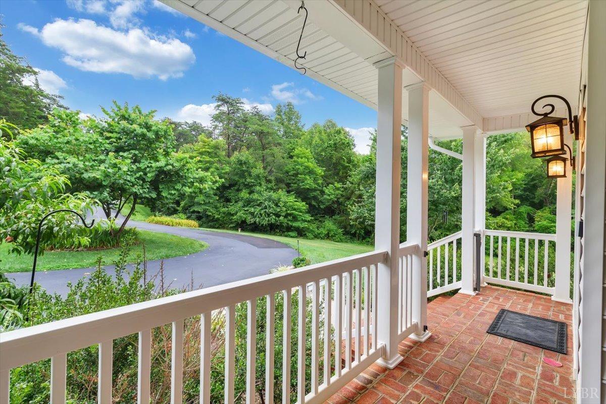 911 Police Tower Road Appomattox, VA 24522 - Photo 39 of 55 a view of a porch with a yard