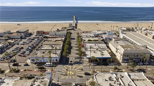 a view of multiple houses with a street