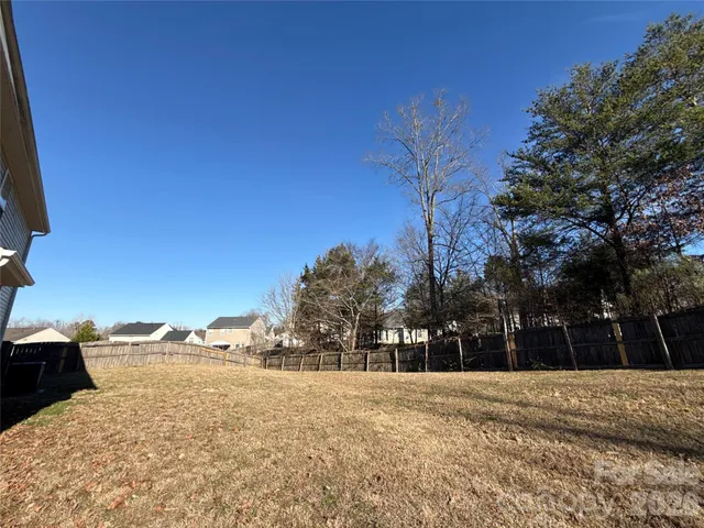 a view of large space with a house