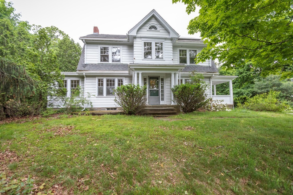 271 Glen Road Weston, MA 02493 - Photo 1 of 21 front view of house with a yard