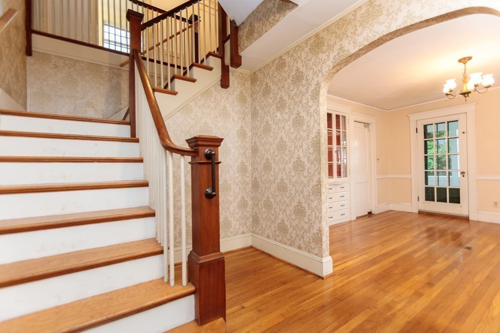 271 Glen Road Weston, MA 02493 - Photo 2 of 21 a view of entryway with wooden floor and stairs