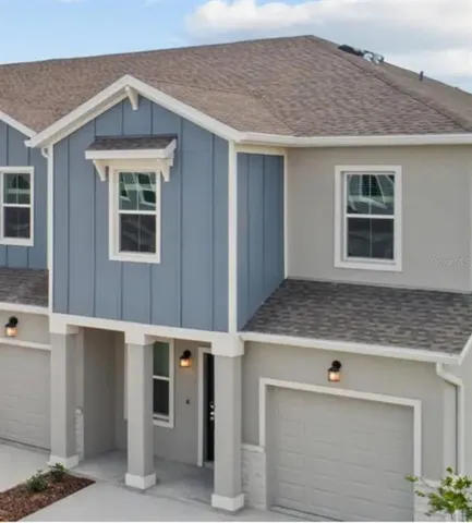 a front view of a house with windows