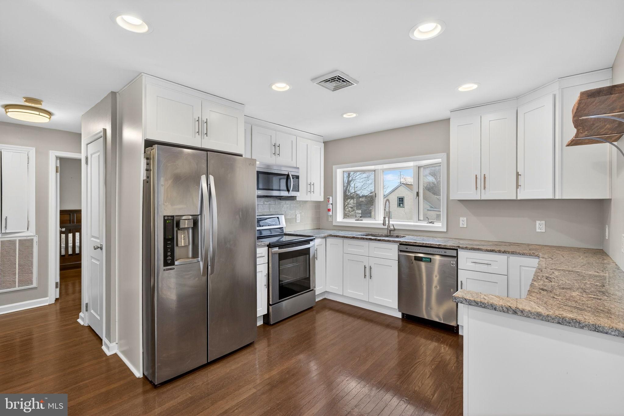 205 South And K Street Spring City, PA 19475 - Photo 11 of 36 Modern kitchen with sleek finishes.