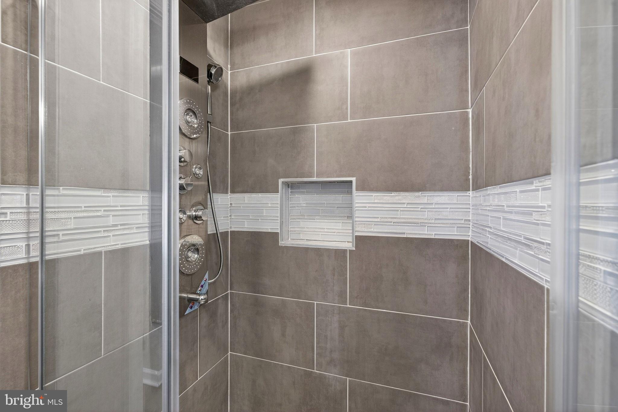 205 South And K Street Spring City, PA 19475 - Photo 23 of 36 Sleek modern shower with elegant tile design.