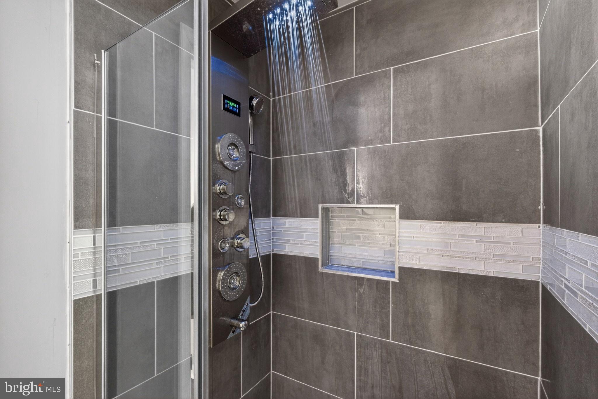 205 South And K Street Spring City, PA 19475 - Photo 24 of 36 Sleek modern shower with elegant tiles.