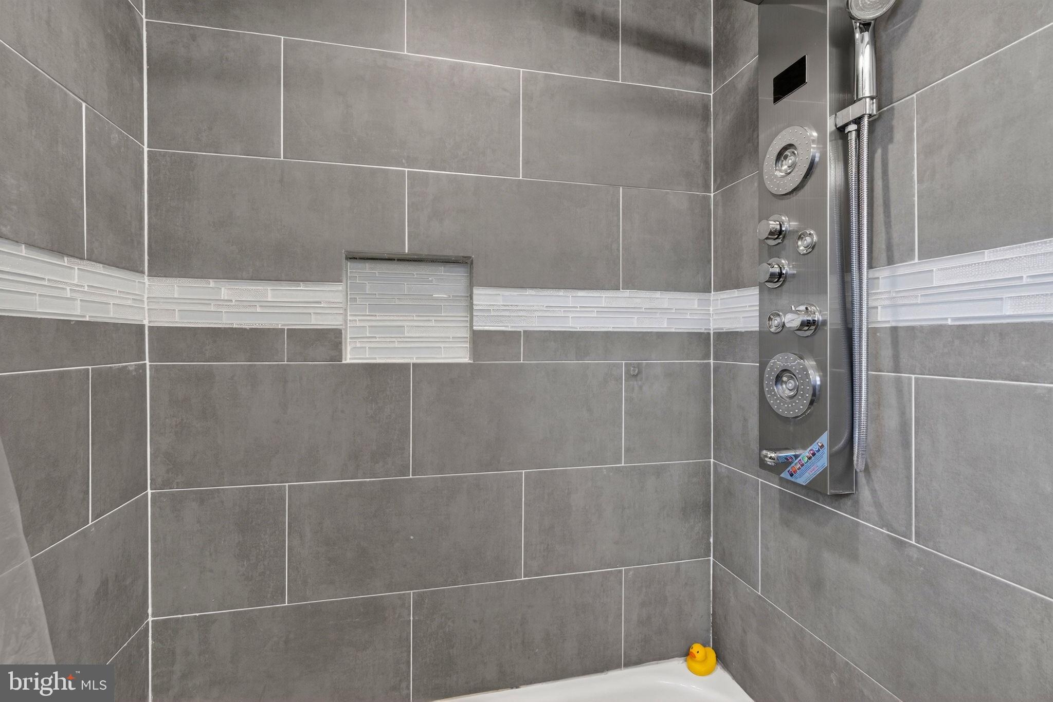 205 South And K Street Spring City, PA 19475 - Photo 30 of 36 Sleek modern shower with elegant tiles.