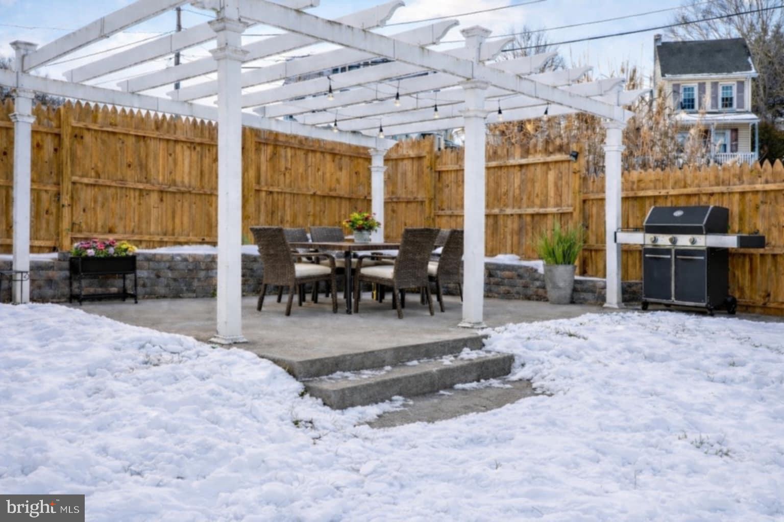 205 South And K Street Spring City, PA 19475 - Photo 8 of 36 Staged patio in winter's embrace.
