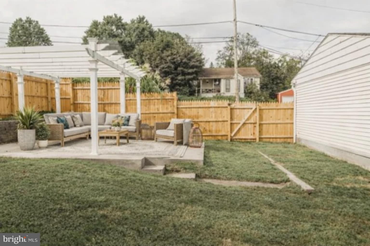 205 South And K Street Spring City, PA 19475 - Photo 9 of 36 Staged backyard oasis with cozy seating.