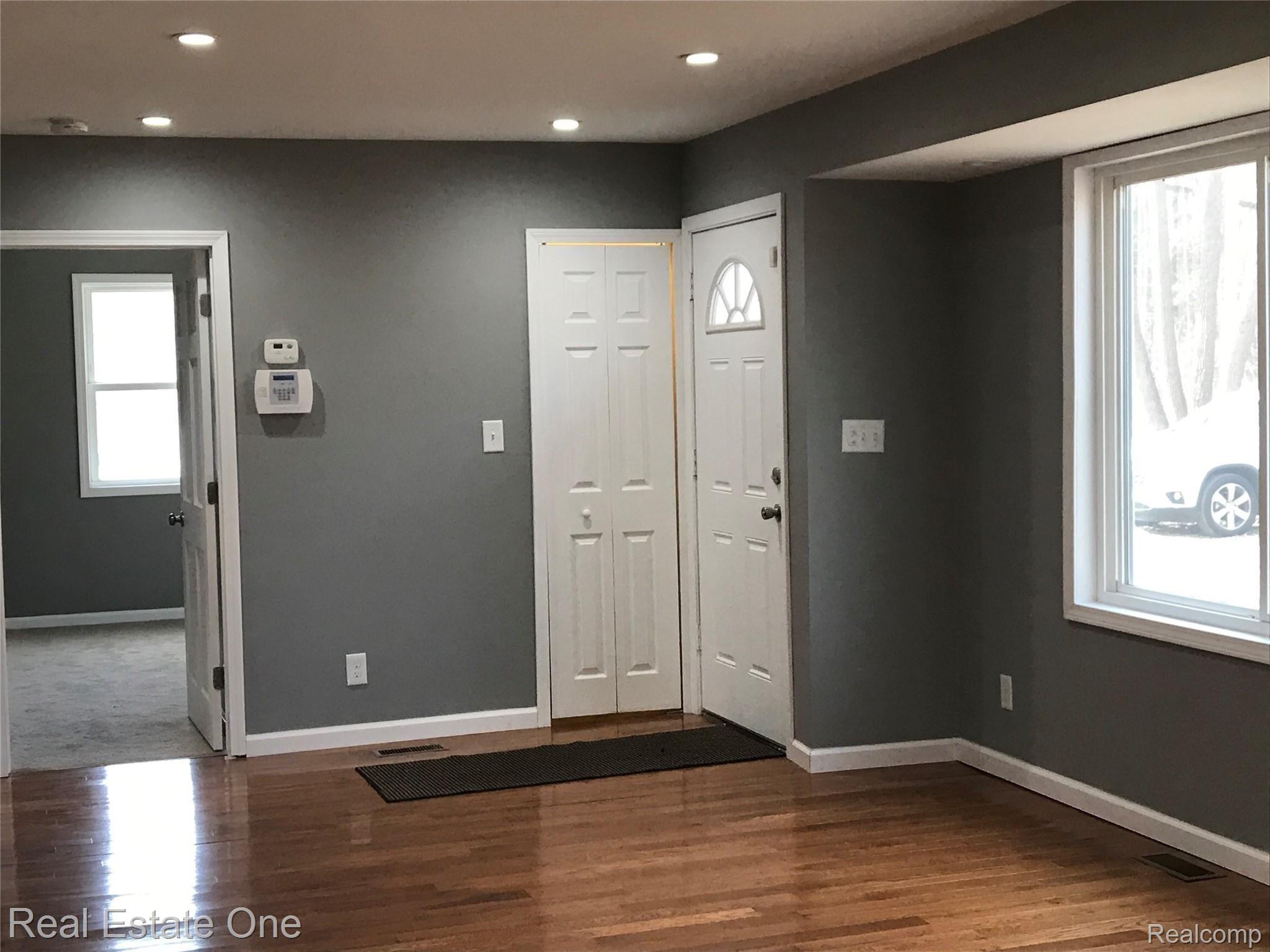 21251 Haggerty Road Belleville, MI 48111 - Photo 6 of 19 Bedroom, lighted coat closet