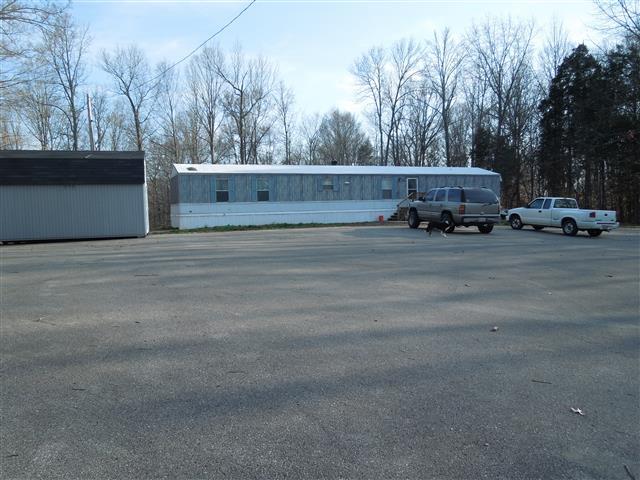 1818 Church Road Clarksville, TN 37040 - Photo 2 of 20 Large asphalt parking area to the front.