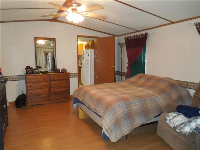 1818 Church Road Clarksville, TN 37040 - Photo 12 of 20 Master bedroom, vaulted ceiling, adjoining Master bath.