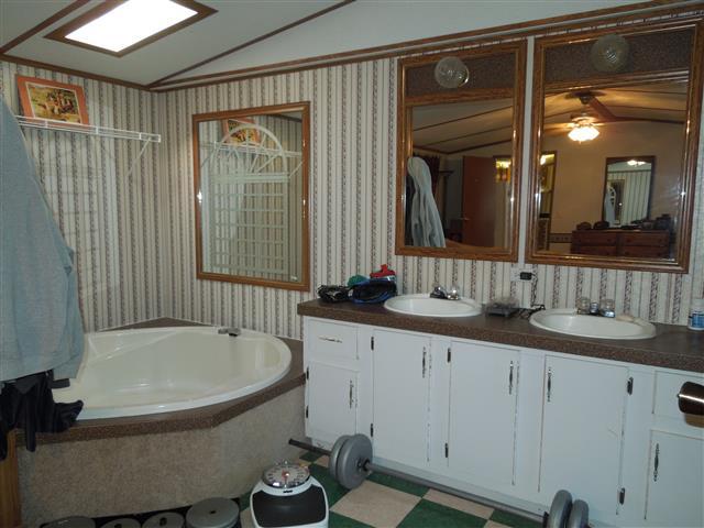 1818 Church Road Clarksville, TN 37040 - Photo 13 of 20 Open area into the Master Bath from the bedroom. Garden tub & double sink vanity.