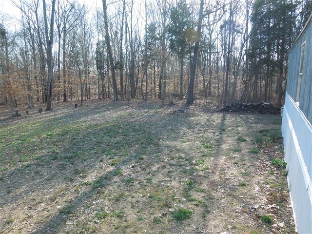 1818 Church Road Clarksville, TN 37040 - Photo 3 of 20 Nice backyard, more property to the back.