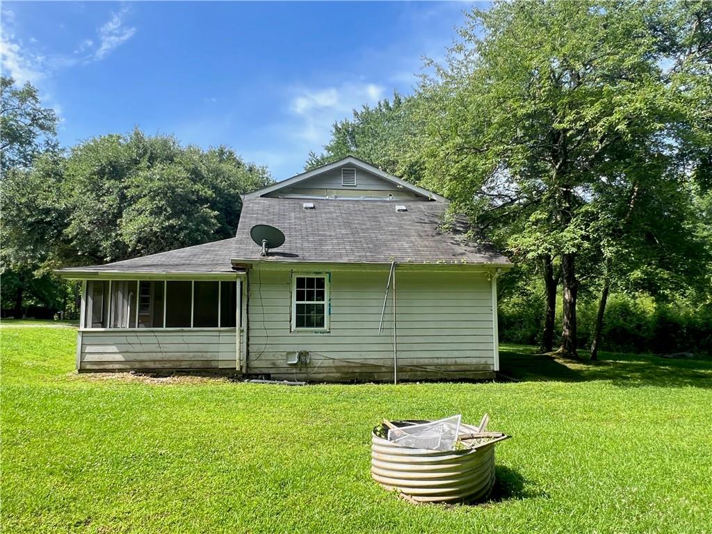 340 Womack Avenue Dallas, GA 30157 - Photo 27 of 29 a front view of a house with a yard