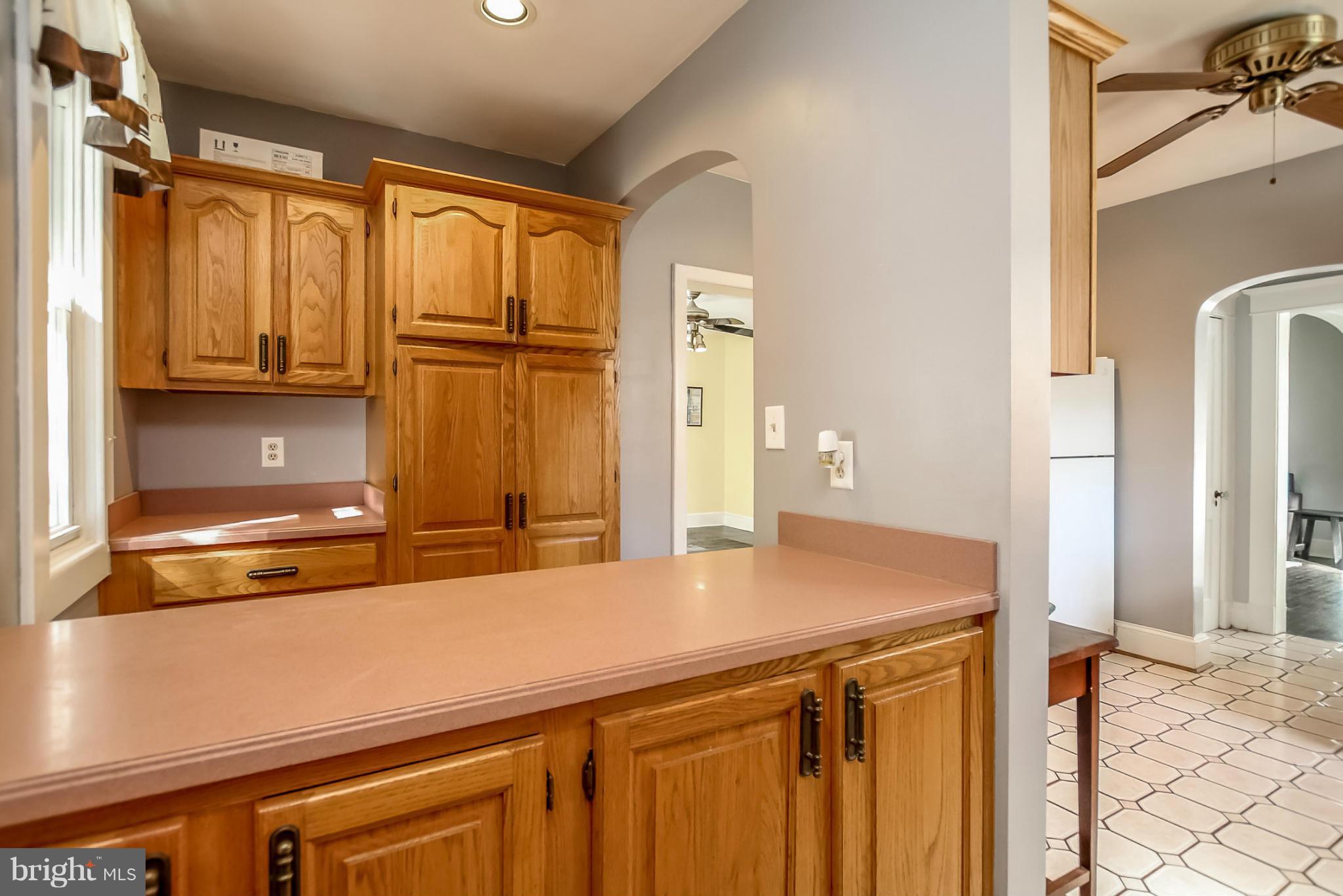 814 Dorchester Road Baltimore, MD 21229 - Photo 12 of 30 a view of a kitchen with a sink and cabinets