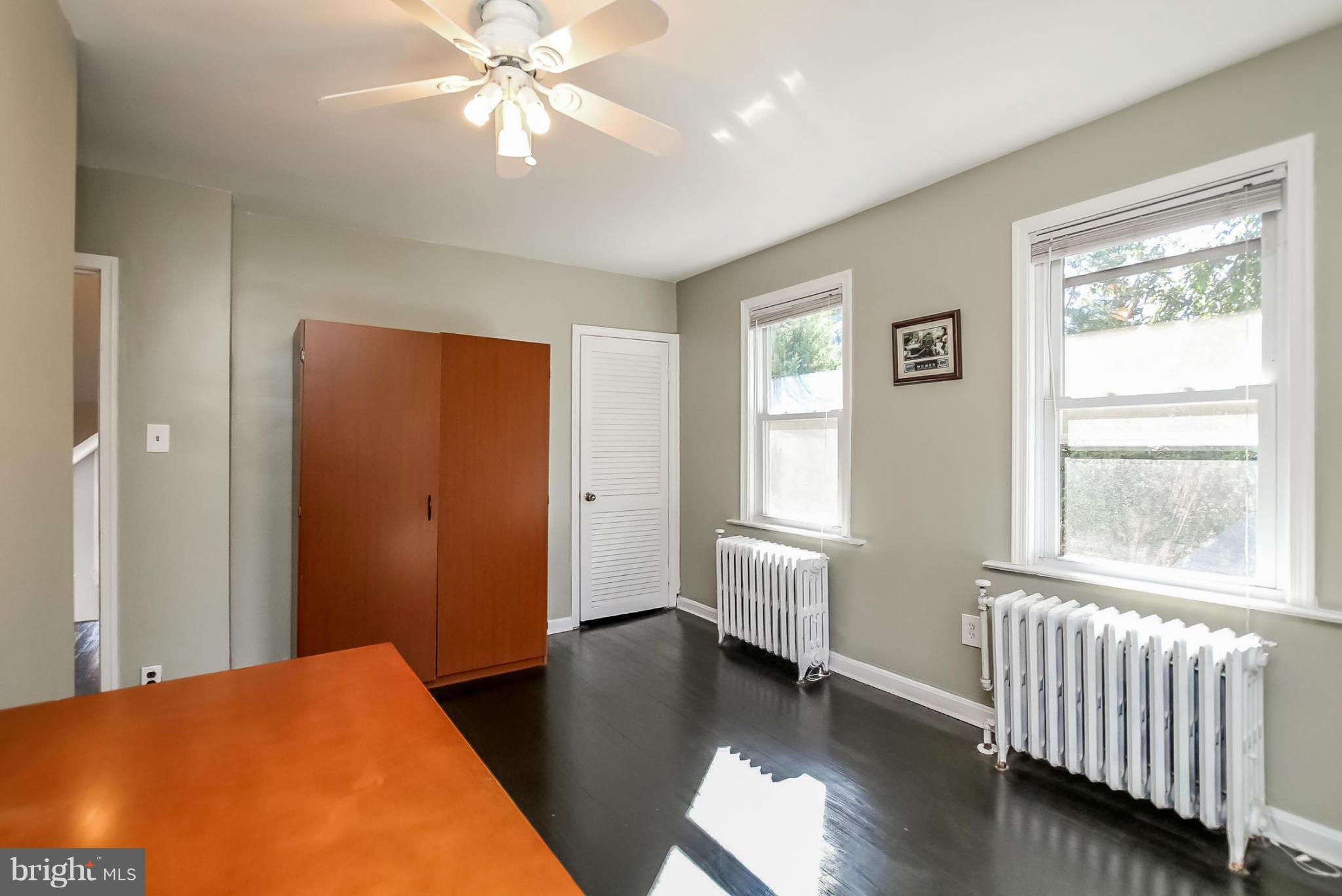 814 Dorchester Road Baltimore, MD 21229 - Photo 19 of 30 a view of a livingroom with a ceiling fan and window