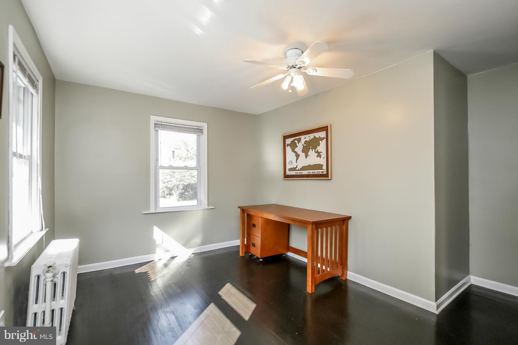 814 Dorchester Road Baltimore, MD 21229 - Photo 20 of 30 a living room with furniture and wooden floor