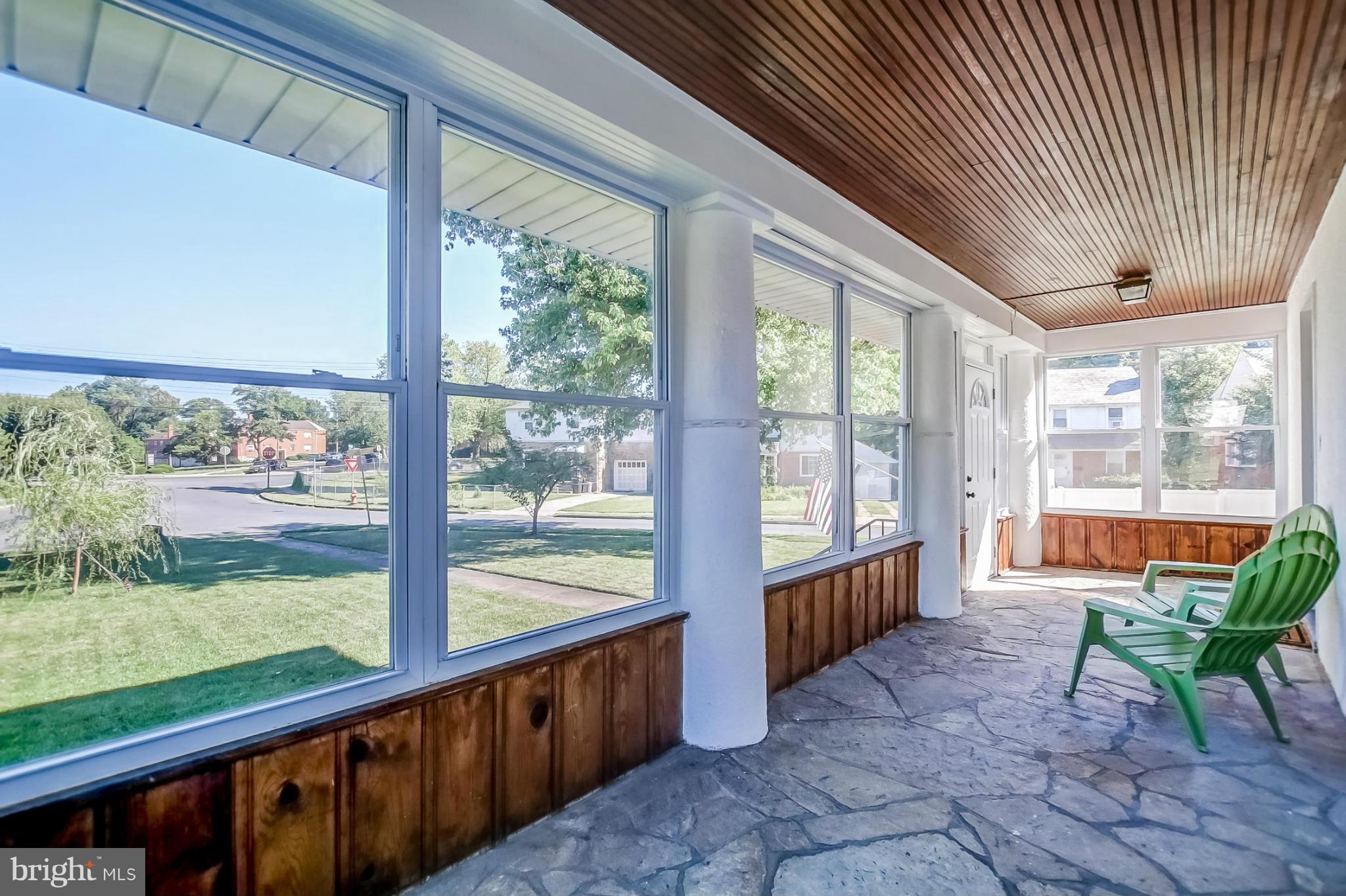 814 Dorchester Road Baltimore, MD 21229 - Photo 3 of 30 a view of a porch with furniture and garden