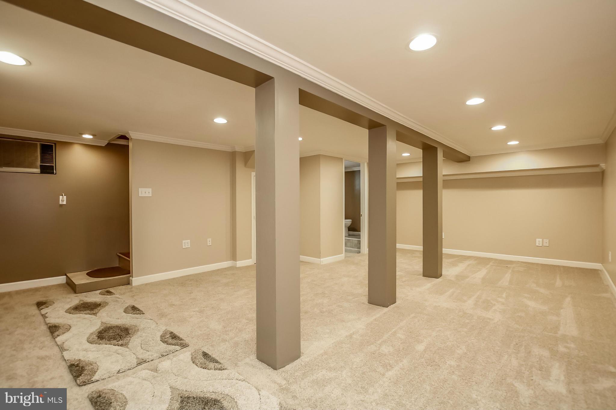 814 Dorchester Road Baltimore, MD 21229 - Photo 23 of 30 a view of a hallway with wooden floor