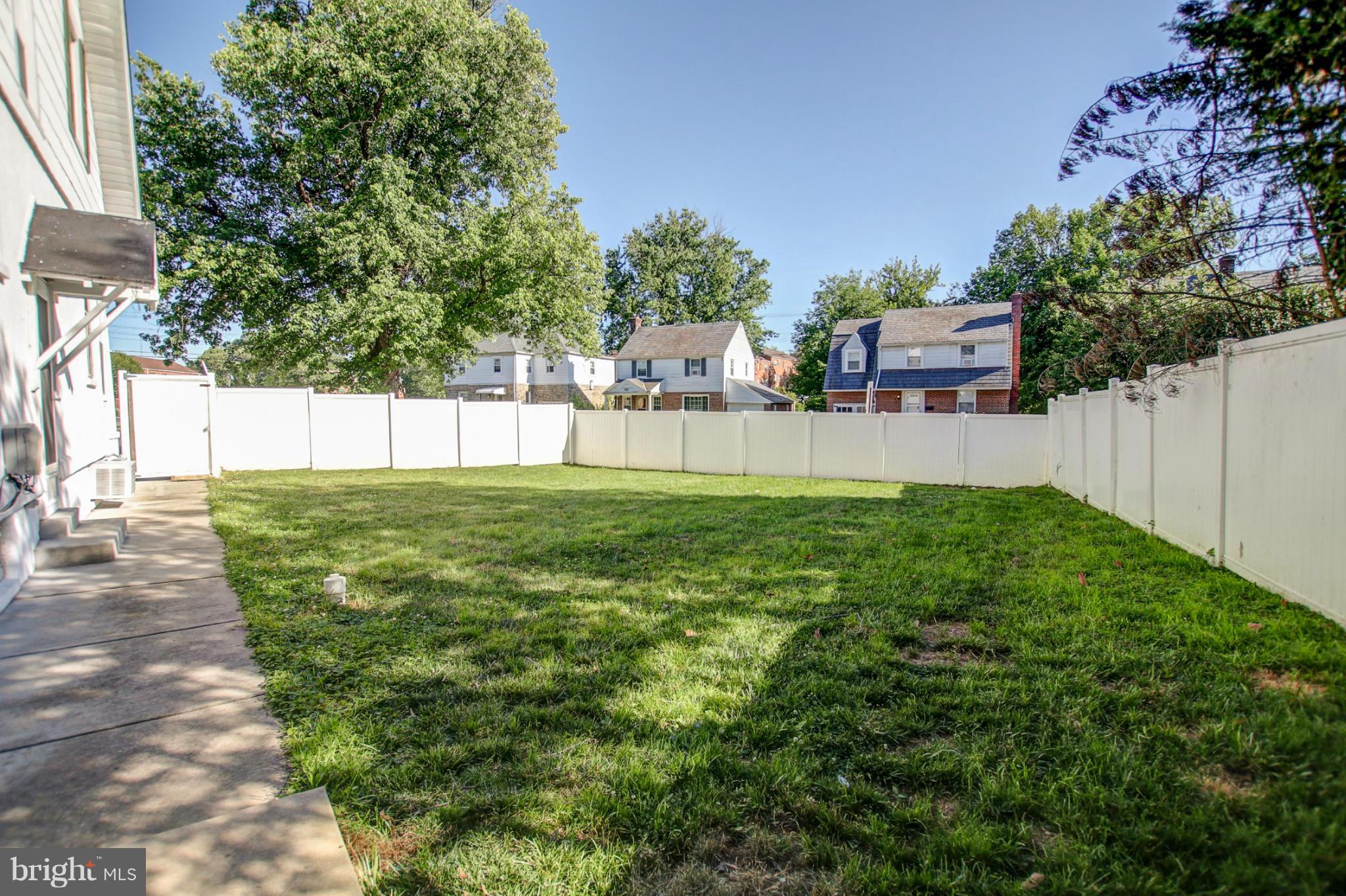 814 Dorchester Road Baltimore, MD 21229 - Photo 25 of 30 a view of a house with a yard