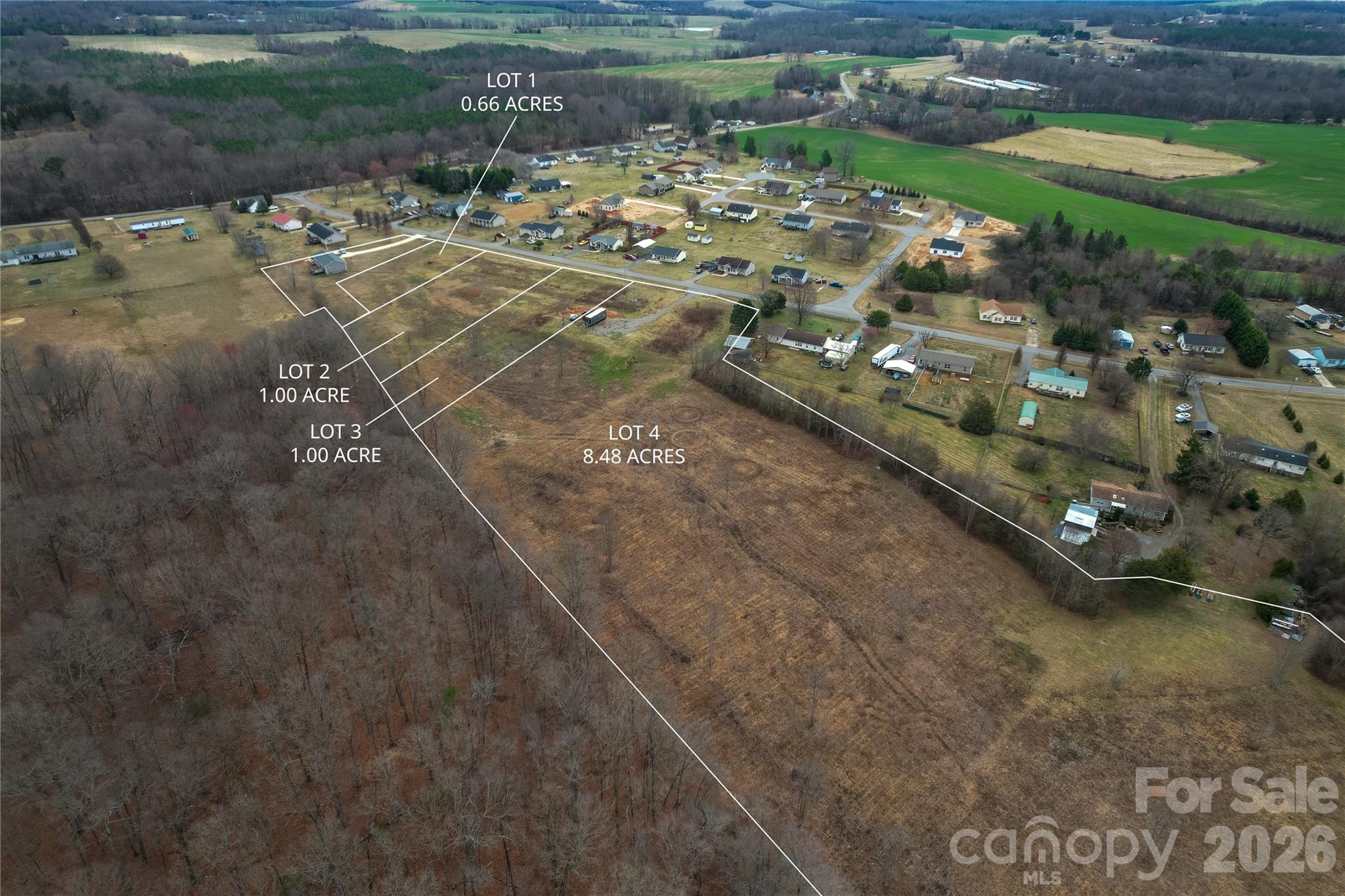 144 Speaks Road, Unit 5 Olin, NC 28660 - Photo 2 of 4 a picture of view of residential houses with outdoor space