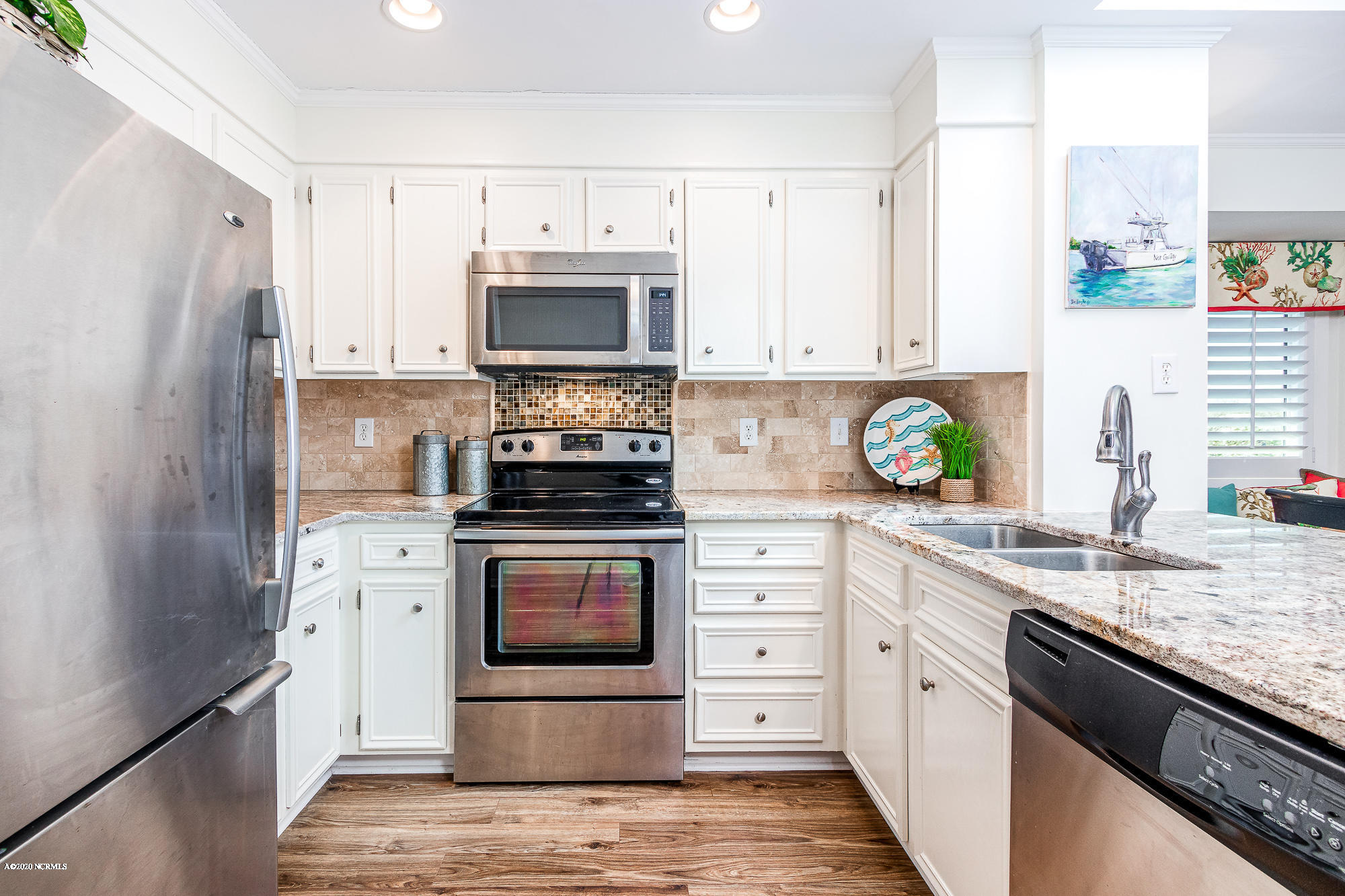 2402 West Fort Macon Road, Unit 306G Atlantic Beach, NC 28512 - Photo 11 of 39 Updated kitchen w/ seating