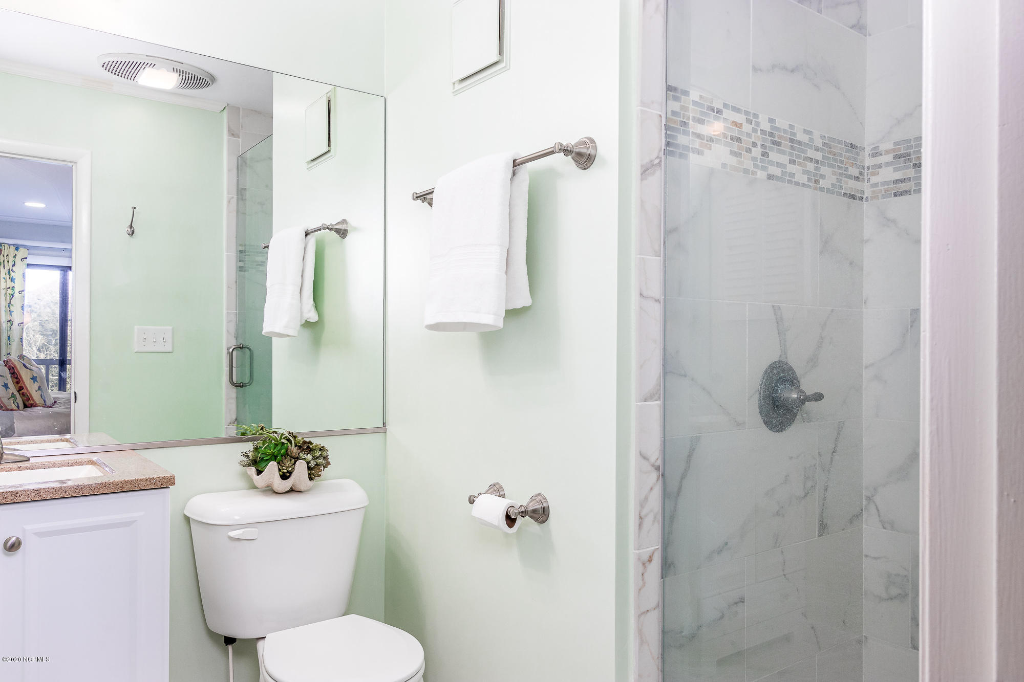 2402 West Fort Macon Road, Unit 306G Atlantic Beach, NC 28512 - Photo 17 of 39 En suite master bathroom