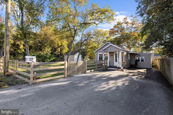a house with trees in front of it