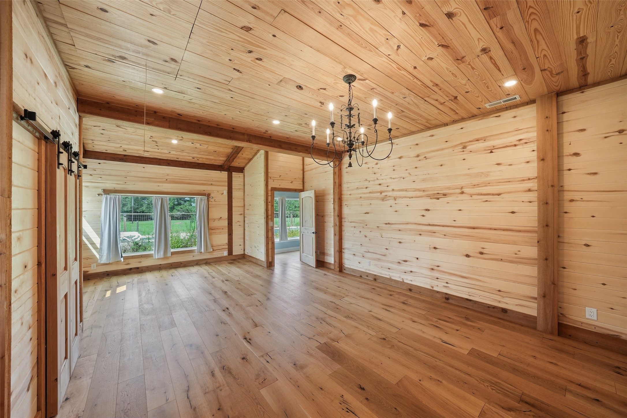 26534 Mitchell Road Hempstead, TX 77445 - Photo 15 of 45 wooden floor in an empty room with a window